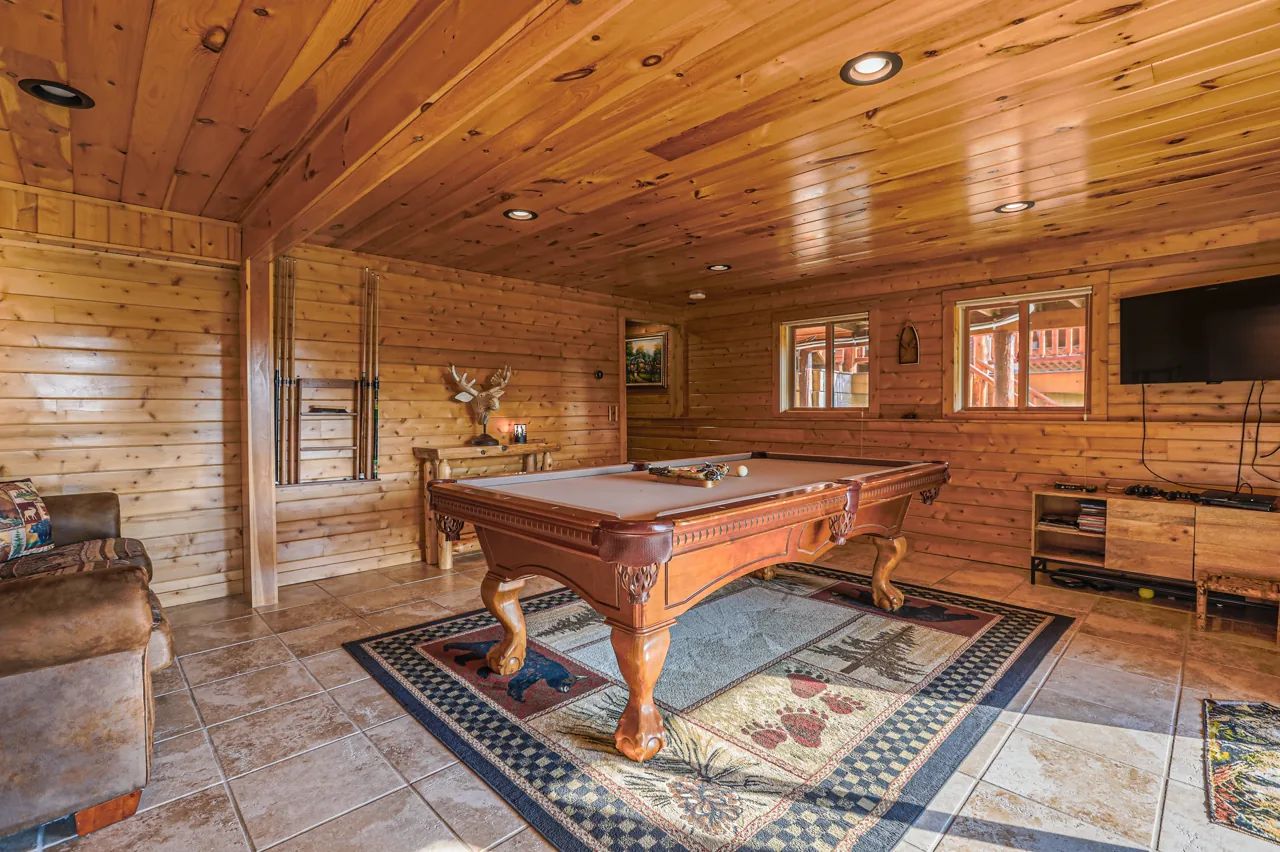 Play room with pool table and seating