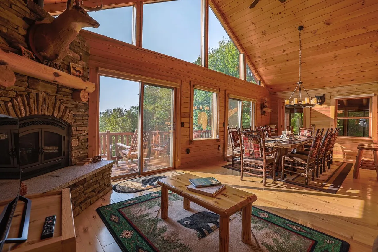 Living room and its tall mountain-facing windows